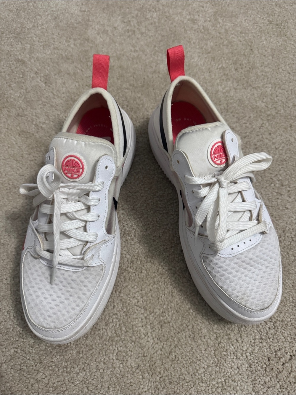 Nike Women’s White Sneakers with Pink Accents